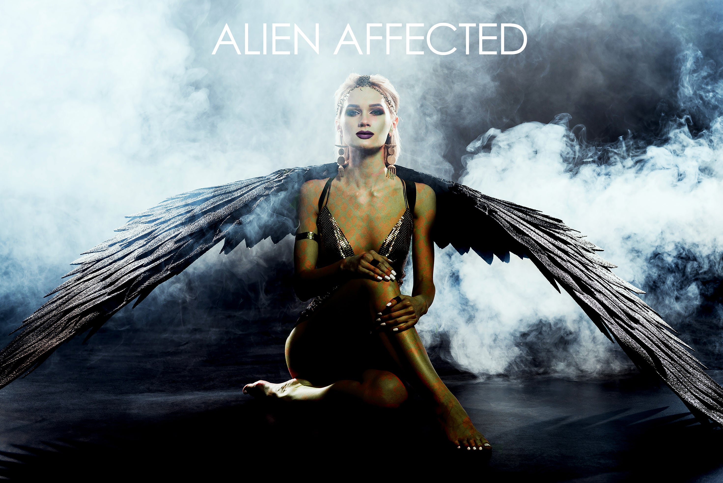 ALIEN AFFECTED SITTING ANGEL